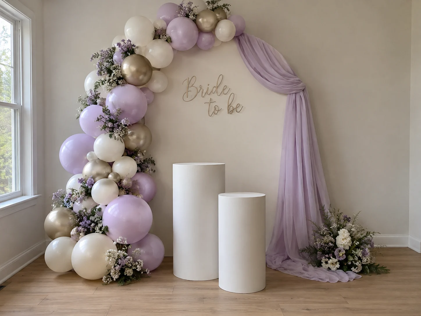 Lilac in Bloom balloon arch, backdrop and plinth styling concept